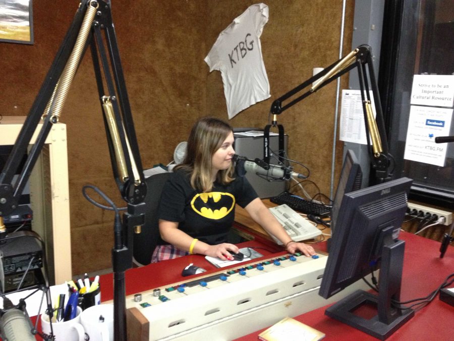 (Photo by Katie Douglas, digitalBURG) Leigh Oleszczak works the board to prerecord her show at 90.9 FM.