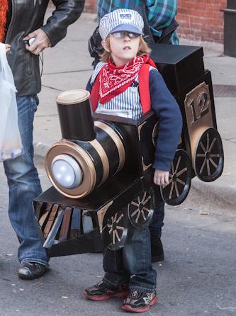 (Photo by Andrew Mather, digitalBURG) Matthew Meehan stands in line with his family while waiting to get more candy.