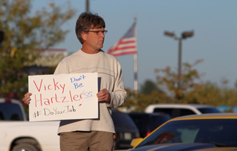 Protestor Randy Higgins holds his sign in opposition to the government shutdown.
Photo courtesy of Michael Bersin/Show Me Progress