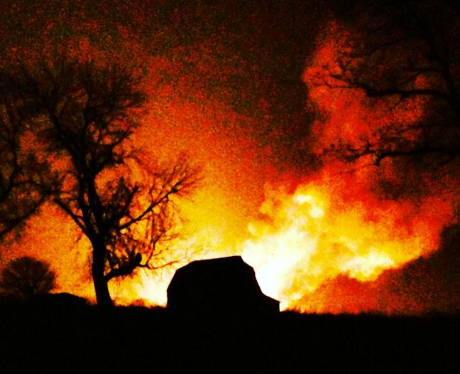 Photo+by+Jamie+DeBacker%0AAn+outbuilding+is+silhouetted+against+the+flames+from+a+gas+line+that+ruptured+shortly+before+midnight+Thursday+in+Pettis+County.+The+photo+was+taken+five+miles+outside+of+Sedalia+along+Route+D.+DeBacker+lives+in+Warrensburg+and+is+a+sophomore+at+the+University+of+Central+Missouri.