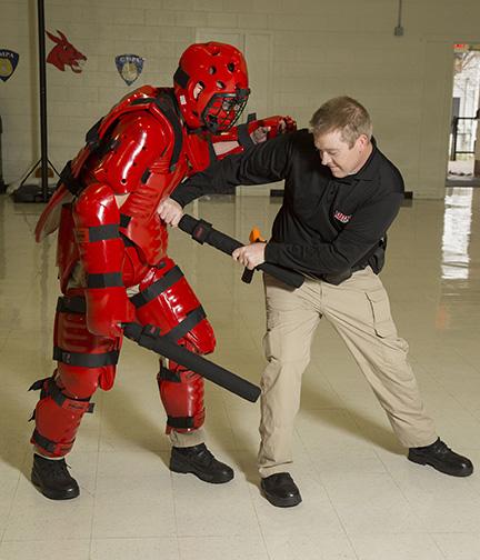 PHOTO SUBMITTED
Recent Central Missouri Police Academy cadets Daniel Henry, left, and Jeremy Head demonstrate the RedMan suit.