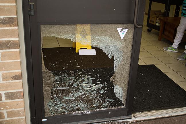 PHOTO BY BRANDON BOWMAN / PHOTO EDITOR
The broken door that was found at the front entrance of the Shiloh Missionary Baptist Church on N. Main St. 