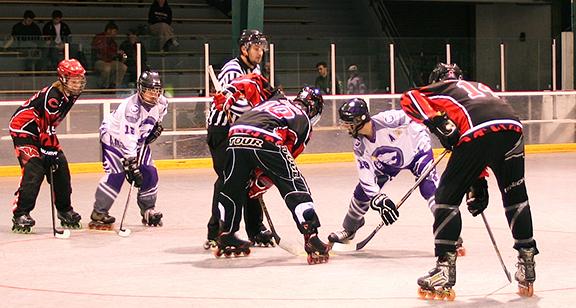 PHOTO SUBMITTED BY ANN RATLIFF
In position to take the face-off, the UCM Roller Hockey team
(in black uniforms) matched up against the Kansas State Wildcats on
March 6 in the semi-finals of the Great Plaiins Collegiate Inline Hockey League playoffs.