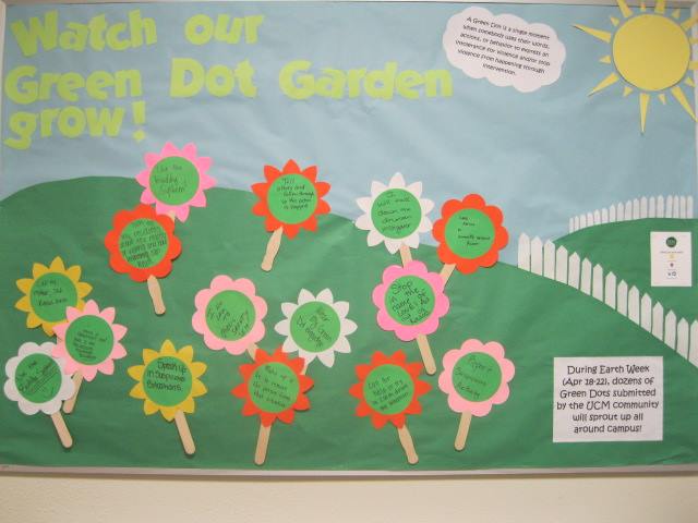 PHOTO SUBMITTED BY LAURI DUSSELIER
The bulletin board outside of the UCM Office of Violence and Substance Abuse Prevention features some of the Green Dot flowers that will be planted during Earth week. 