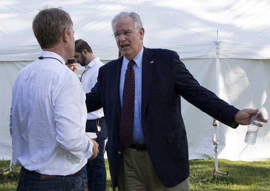 PHOT BY MATT BIRD-MEYER / FACULTY ADVISER
From left, Attorney General Chris Koster and Democratic candidate for governor, speaks with Gov. Jay Nixon Thursday outside of the Director’s Tent during the Missouri State Fair Governor’s Ham Breakfast in Sedalia.