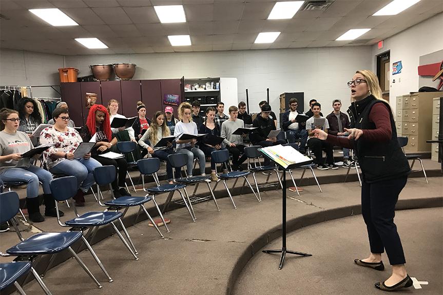 PHOTO BY GABRIELLE MOORE / WHS JUNIOR
Whitney Andersen directs one of her choir classes at WHS.