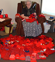 Warrensburg woman knits caps for infants for Heart Month