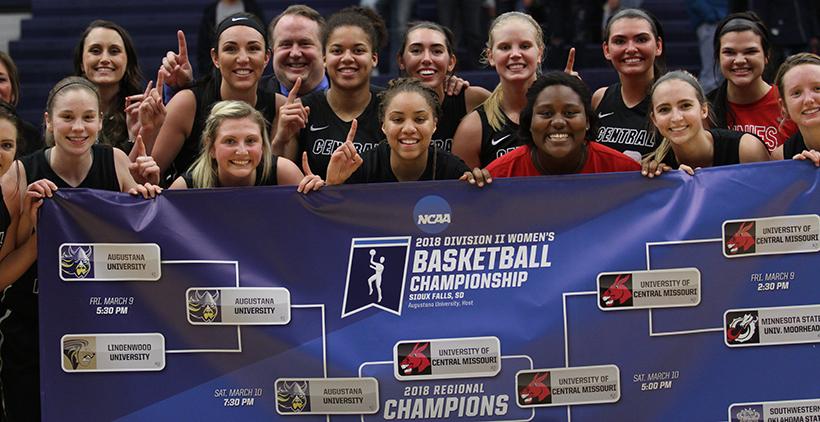 The Jennies celebrate their 81-42 victory over Augustana and Central Region Championship Monday in Sioux Falls, South Dakota.