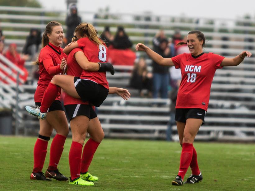 Senior Courtney Killian embraces fellow senior Emily Griffin (#8) following her eighth goal of the season in the Jennies 2-0 victory over Nebraska-Kearney Sunday at South Recreational Complex. (Photo by Peter Spexarth/For the Muleskinner)