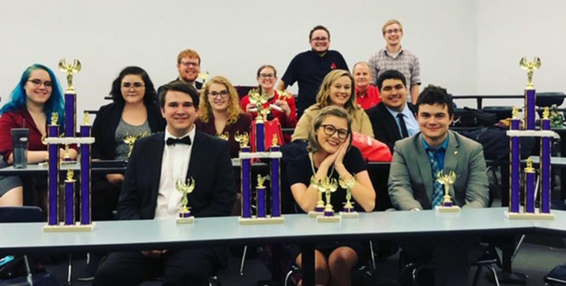 The+Talking+Mules+after+the++Bob+R.+Derryberry+Memorial+Tournament+hosted+by+Southwest+Baptist+University+in+Bolivar%2C+Missouri.+On+the+front+row+from+left+to+right+are+Benjamin+Barnett%2C+Abbie+Upshaw+and+Trenton+Hawes.+On+the+second+row+from+left+to+right+are+Sam+DuVall%2C+Adina+McCall%2C+Madison+Marquardt%2C+Courtney+Callahan+and+Manny+Reyes.+On+the+thrid+row+from+left+to+right+are+Joshua+Boster%2C+Samantha+Callaway%2C+graduate+assistant+and+coach+Tyler+Slinkard%2C+Jack+Rogers%2C+director+of+forensics%2C+and+Alex+Amos%2C+graduate+assistant+and+coach.