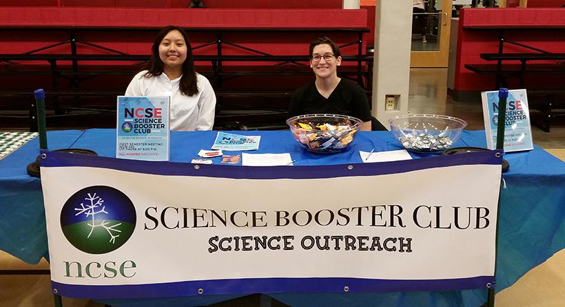 (Photo courtesy of Laurie Luckritz)
From left, Vice President Alicia Carbajal and Program Leader Laurie Luckritz work at the table for the UCM chapter of the National Center for Science Education at the Spring Involvement Fair.