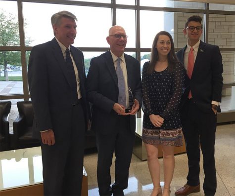 UCM President Roger Best; Kirkpatrick award winner Chuck Ambrose; SGA past President Courtney Abt and SGA newly elected President Cole Fine pose for a photo with Ambrose and his award. (Photo by Erin Wides/Features Editor)