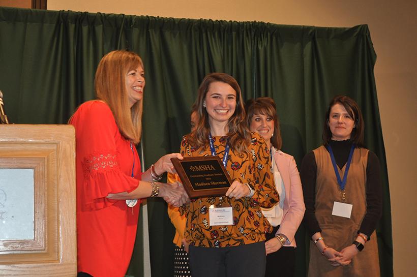 Madisen Sherman accepts the MSHA Most Outstanding Graduate Award April 6 at Tan-Tar-A Resort in Osage Beach, Missouri. (Photo submitted by Kimberly Stewart/For the Muleskinner)