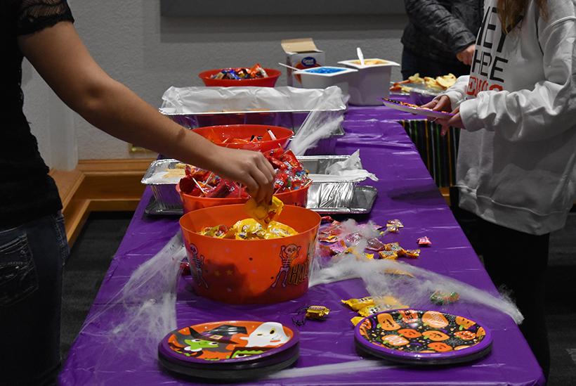Snacks and drinks were available for students to munch on at the Halloween Bash Oct. 31 in the Elliott Student Union. (Photo by Madeline Turner)