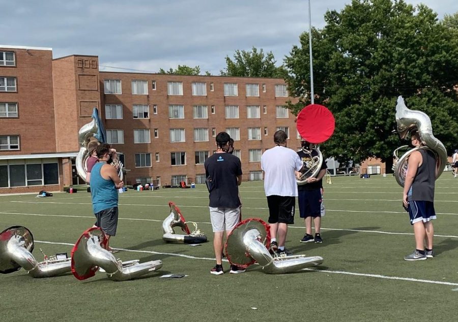 The Marching Mules have adapted to COVID-19 precautions by putting their instruments in special bags or using bell coverings.