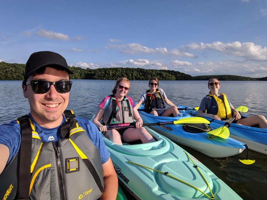 From left: Max, Natalie, Michelle and Maddy pose for a photo on the lake. “I enjoy kayaking with my friends because it’s a fun way to stay active without having to run,” Anderson said.