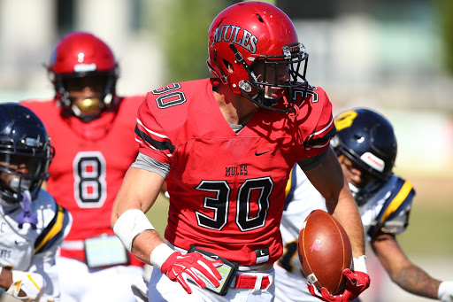 Zach Davidson is an award-winning football player. Although he is not playing football this fall, he continues to practice and look on the bright side of the situation. 