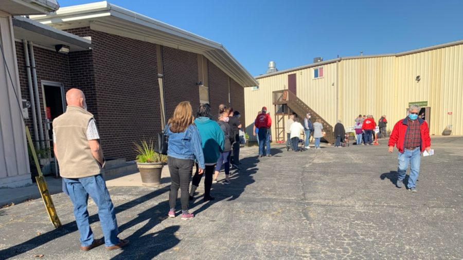 Voters wait in line at New Hope Baptist Church in Independence, Missouri to make their voices heard in the 2020 Presidential election.