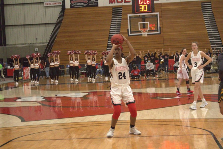 Nija Collier attempts to make a free throw attempt on Feb 26., against the Broncos. 