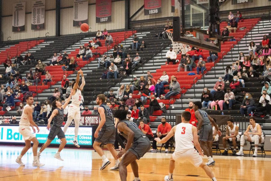 Senior guard Cameron Hunter jumps to make a point. We knew that we were taking a punch from them, and I don’t think we answered it well, head Men’s Basketball Coach Doug Karleskint said. 
The Mules lost to Ichabods 70-68. 