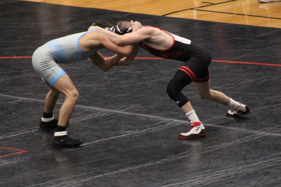 At 125 pound weight class, freshman Trevor Wishne is in position with his opponent, JJ Gillbert. The match lasted the full seven minutes but in the end Gillbert won the match. The Jets started off 5-0 against the Mules.