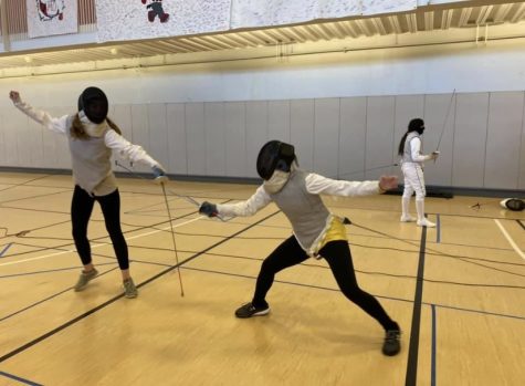 During practice, the fencing club practices with each other to improve their skills. They practice in the Student Recreation and Wellness Center. Photo submitted by Hanna Grace. 
