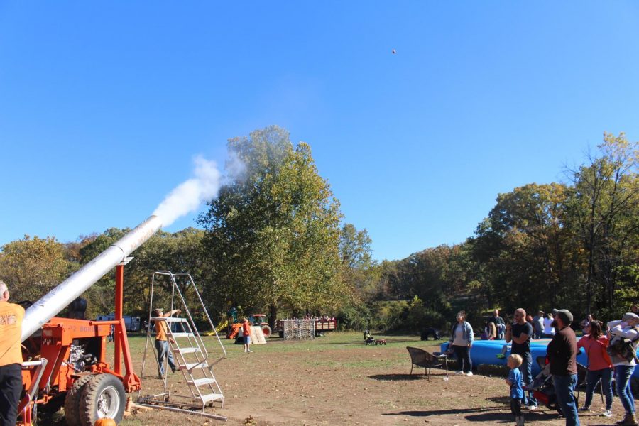 The cannon, mere seconds after being fired — try to spot the pumpkin midair. 