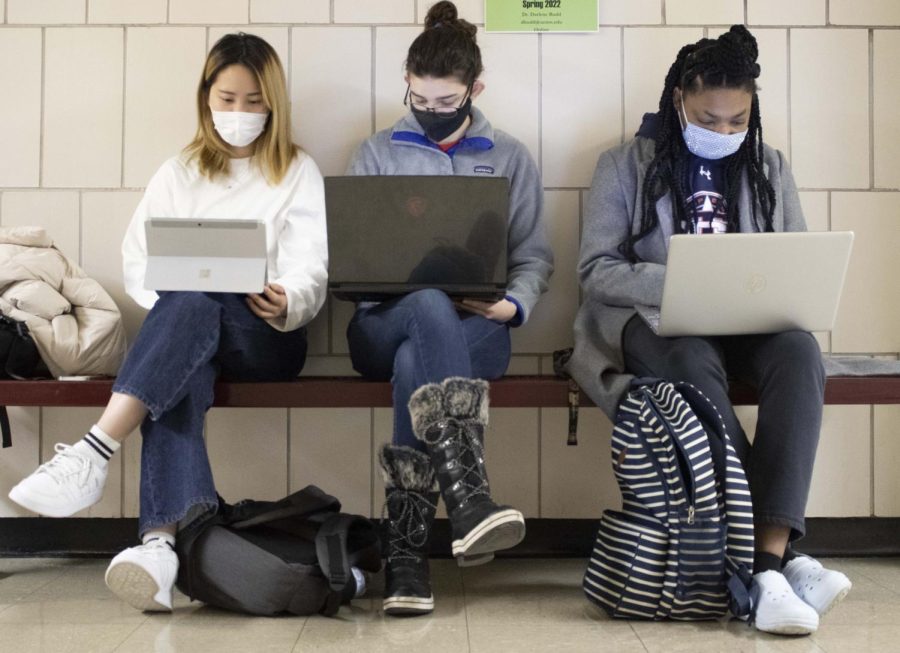 From left to right Ichino Murakami, Mylanna Holman, and Delyla Boyd sit together wearing face masks and attending an online course. People are losing their lives, so its important that you just wear [a mask] to participate whether you agree or disagree, Boyd said.