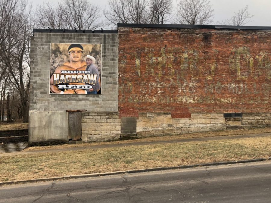 The Bruce Reed mural is located at 311 N. Main Street. The wrestling legend died on February 5, 2021, and the mural was dedicated on December 9, 2021.
