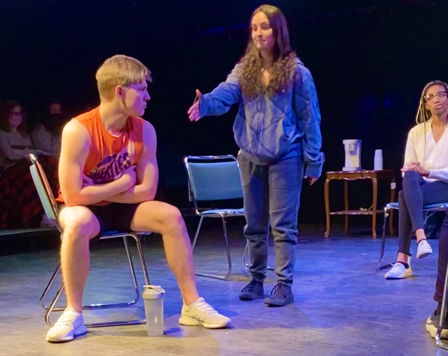 Junior BFA theatre performance major Riley Given plays the role of a disgruntled jock after being offered a sketchy deal by a sticky-handed thief, played by sophomore musical theatre major Miranda Muenz in Living in Fear” by Christopher Lindsay.