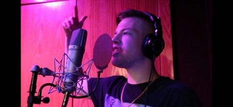 Widman tracking vocals at GFM Recording Studios, showcasing his drive and passion for rap music. Photo by Sterling Widman