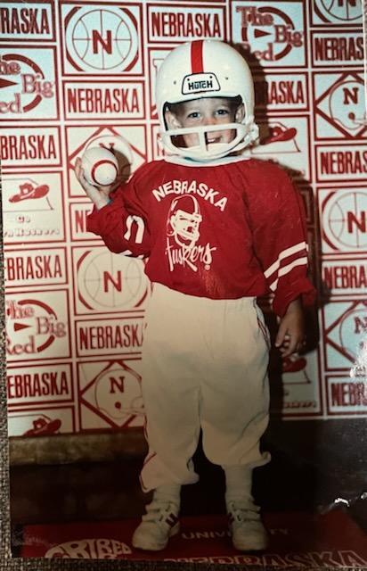 Josh Lamberson, age 4, wearing a Huskers football uniform. Lamberson has had a passion for football since a young age. “He never played with trucks or cars or building blocks, it was always with a ball,” Marcia Lamberson said.