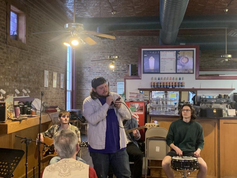 {left to right} Jack Roccaro, Steven Houser and Connor Sloan perform the original song, Untangle MY Mind, during their set at the Open Mic Night at Java Junction.