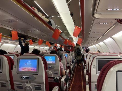 Hainan Airlines carried out the first evacuation flights organized by the Chinese government. The Chinese flag was pasted in the cabin, Wang said. Im very excited because it means Im in the safe zone.