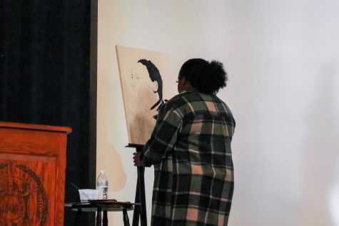 Social Work major Evelyn Neal at the University of Central Missouri performed by drawing to Dr. Martin Luther Kings speech at the Freedom Scholarship Fundraiser event to honor MLKs legacy on Jan. 17.