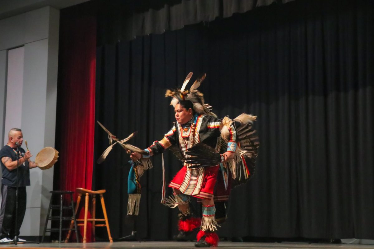Cory Chavez performs a Native American traditional song and dance to showcase Native American cultures. Beyond the Circle, a multigenerational performance group, performed at the University of Central Missouri to celebrate the Trading Moon Native American Arts Festival on Nov. 7.