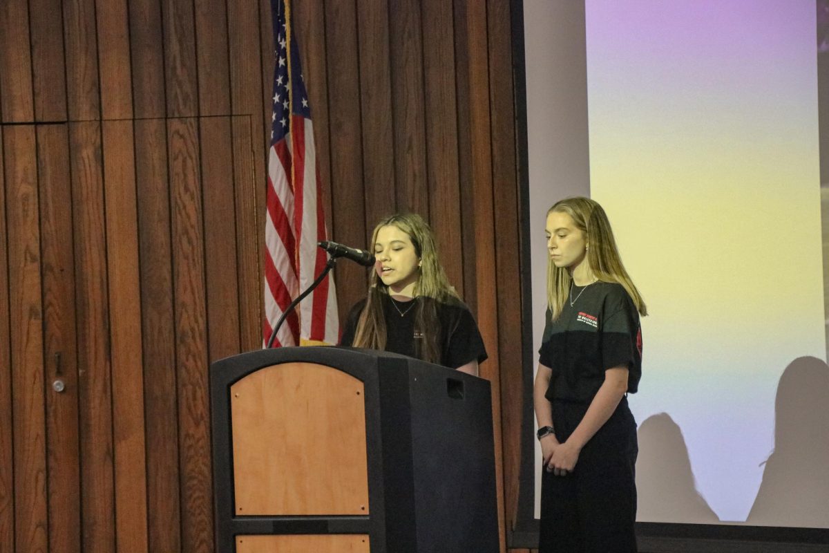 The Muleskinner staff, featuring Linda Alviar (left), News Editor, and Darby Mostaffa (right), Features Editor, introduce Sally Jenkins to the audience during the Author Talk presentation. The presentation included an introduction, a speech, and a Q&A session with the audience.