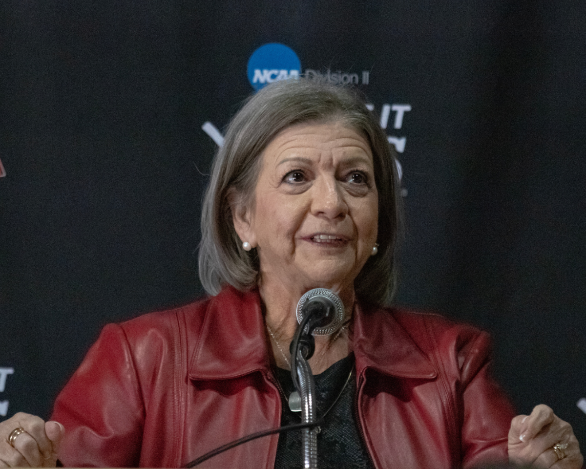 Vici Hughes speaks at the ceremony renaming the Multipurpose building to the Jerry M. Hughes Athletics Center on Feb. 17. Vici Hughes is the widow of Jerry Hughes, for whom the building was named after. 