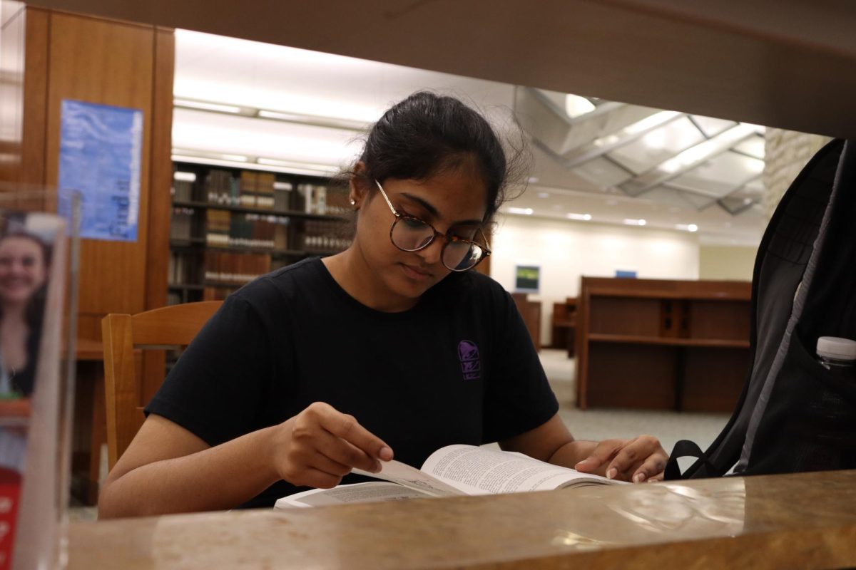 Meghana Reddy,
an international student
studying at UCM, sits
at a desk in the James
C Kirkpatrick Library
where she studies for
class. Reddy believes
that setting a routine
can be difficult but is
important for academic
success, as it helps her
face daily challenges. 