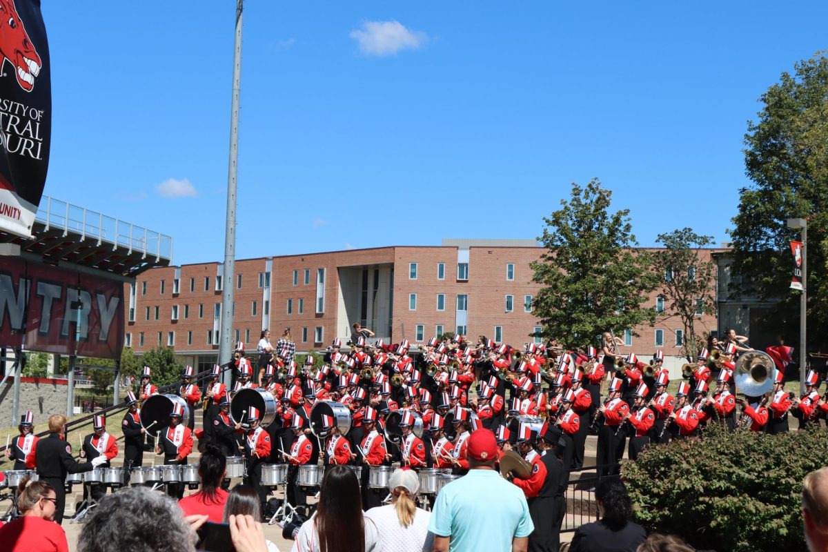 Members of the UCM Band perform outside the football stadium as part of the Get The Red Out celebration on Sept. 7. The UCM band is composed of both music and non-music majors and performs at
most football games. 