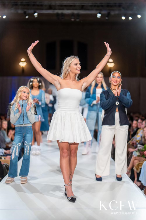 Lindsday Dobson stands with the models of her collection on the runway at Kansas City Fashion Week. Student Designers are given the opportunity to share their skills at KCFW by applying and meeting with KCFW's Style Board. 
Photo Submitted by KCFW