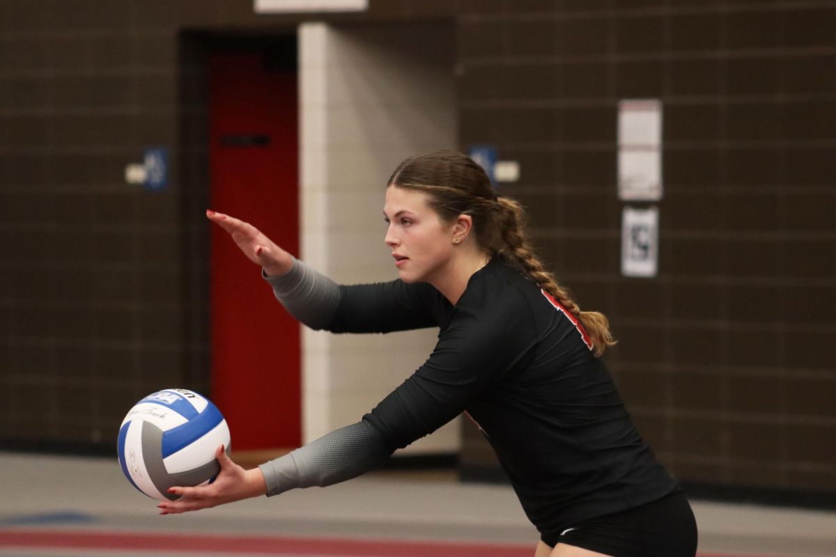 Freshman Brenna Kelly prepares to serve the ball for the Jennies. Kelly was a Colorado All-Star Team member and three-time Honorable Mention All-League performer at Grandview High School.