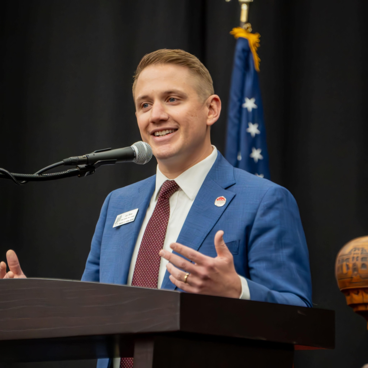 Cory Bittner, UCM alumnus and Secretary of the Alumni Foundation Board of Directors, speaks at the 2024
spring commencement. Bittner graduated from UCM in 2011 and met his wife and current business partner
through UCM. Photo submitted by Cory Bittner.