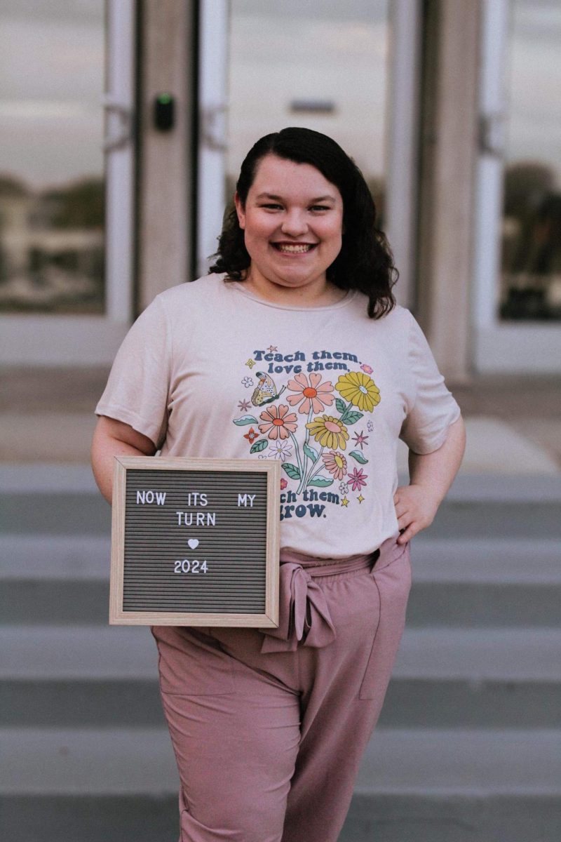 Joanna Curless celebrates her graduation from UCM in
May of 2024 in front of the Lovinger Building. Curless

earned her bachelor’s of science in education and par-
ticipated in student teaching during her time at UCM.

Photo submitted by Joanna Curless.