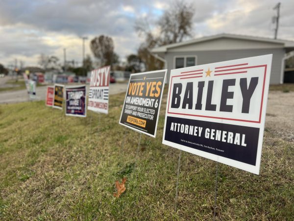 Numerous political yard signs are displayed outside of the Johnson County Republican Headquarters, located at 1202 South Maguire St. 