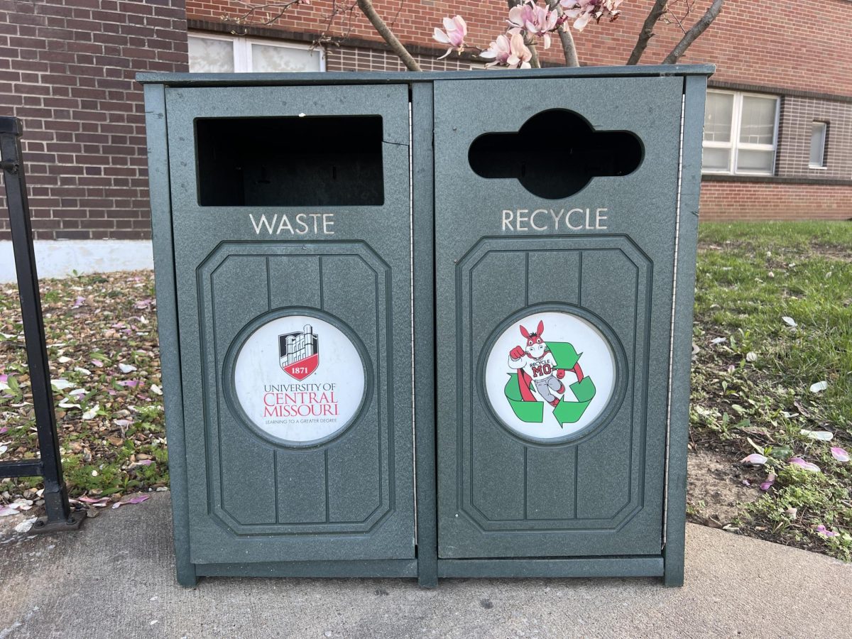 A garbage and recycling bin sit outside of Ellis on UCM’s campus. Because UCM’s waste disposal system is separate from the city’s, UCM has been able to recycle while the city could not.