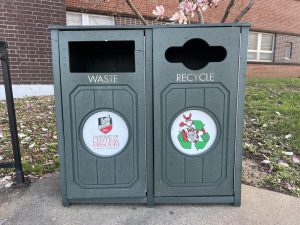 A garbage and recycling bin sit outside of Ellis on UCM’s campus. Because UCM’s waste disposal system is separate from the city’s, UCM has been able to recycle while the city could not.