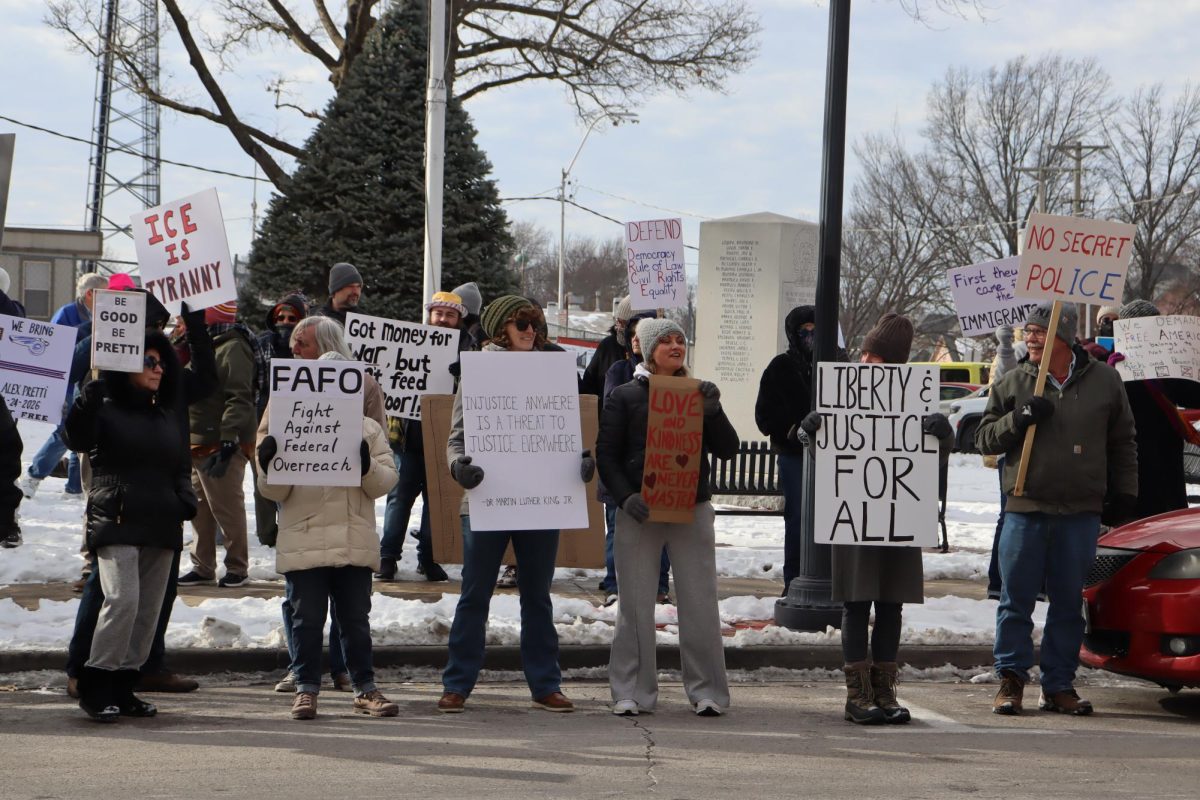 Demonstrators from seven different counties surrounding Warrensburg gather on the courthouse lawn. The protest was organized by local organization Burg Resist.
