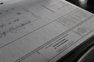 Blueprint plans outline the layouts and fixtures for the new Dunkin’ Donuts at the Crossing. The UCM Board of Governors approved the construction bid for Dunkin’ in February 2026.