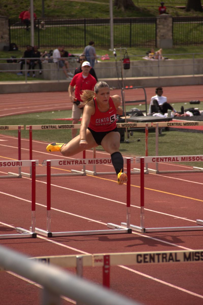 Sophomore Pau Martinez leaps over hurdles on April 10. Martinez finished third in women’s 100 meter hurdles with a personal best time of 14.44 seconds.
